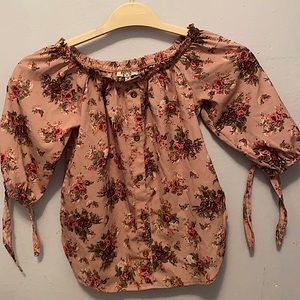 Pink floral blouse with gold buttons and pockets